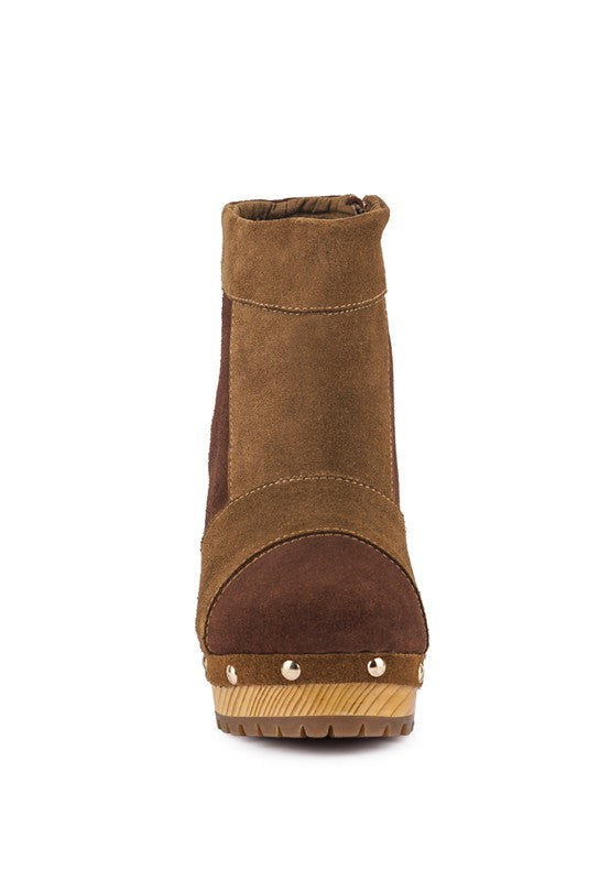 Chocolate brown chunky heel suede boots for women with stylish studded detail and textured sole