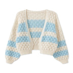 Chunky knit blankets in cream and blue for cozy home decor