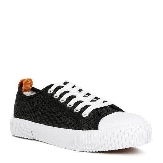 Women's black chunky lifestyle sneakers with white sole, casual wear