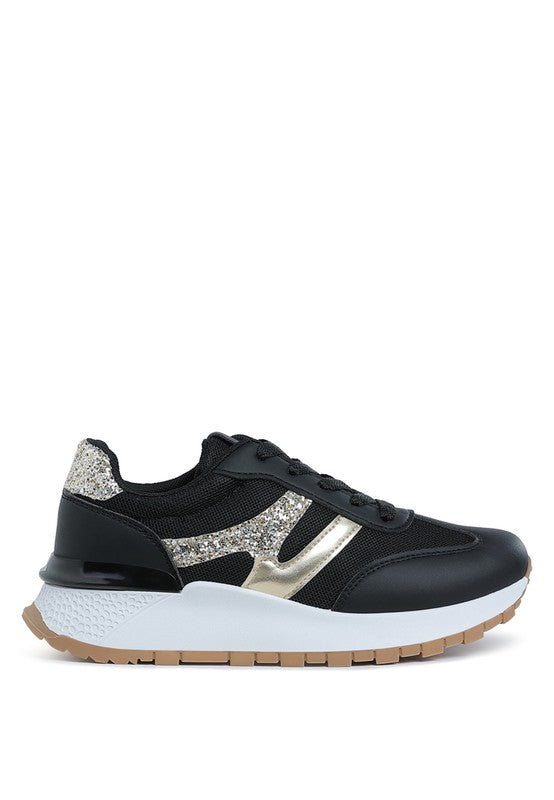 Women’s black chunky lifestyle sneakers with gold accents for casual wear
