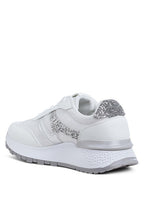 Women's white chunky lifestyle sneakers with silver accents for casual wear