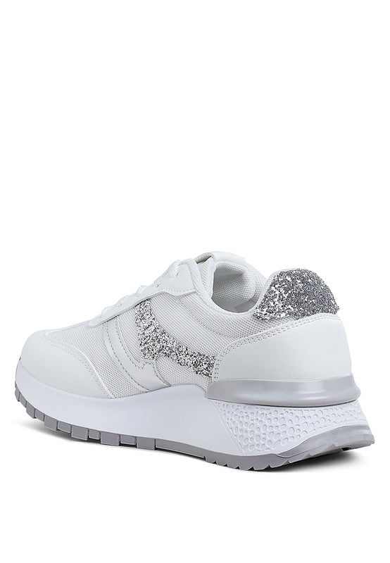 Women's white chunky lifestyle sneakers with silver accents for casual wear