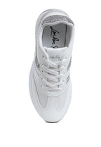 Women's white chunky lifestyle sneakers with silver accents for casual wear