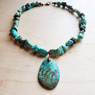 Chunky turquoise teardrop necklace featuring unique stone accents for a vibrant look