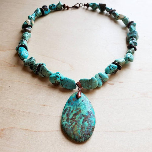 Chunky turquoise teardrop necklace featuring unique stone accents for a vibrant look