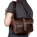 Stylish vintage brown leather classic shoulder bag for men with adjustable strap and buckle closure