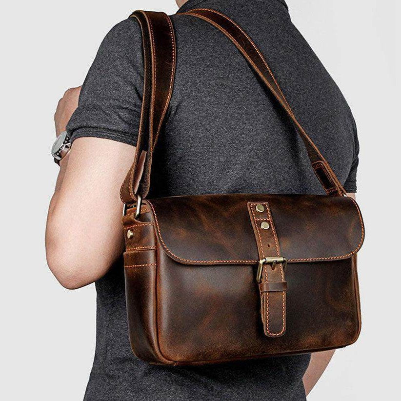 Stylish brown leather classic shoulder bag for men with adjustable strap and buckle closure