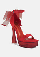 Red clear high heeled sandals from London Rag International with an elegant bow detail