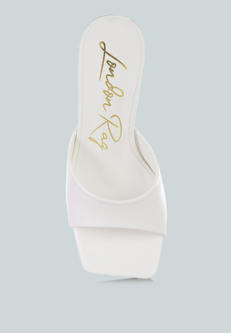 White clear spool heel sandals by London Rag International with a stylish minimalist design