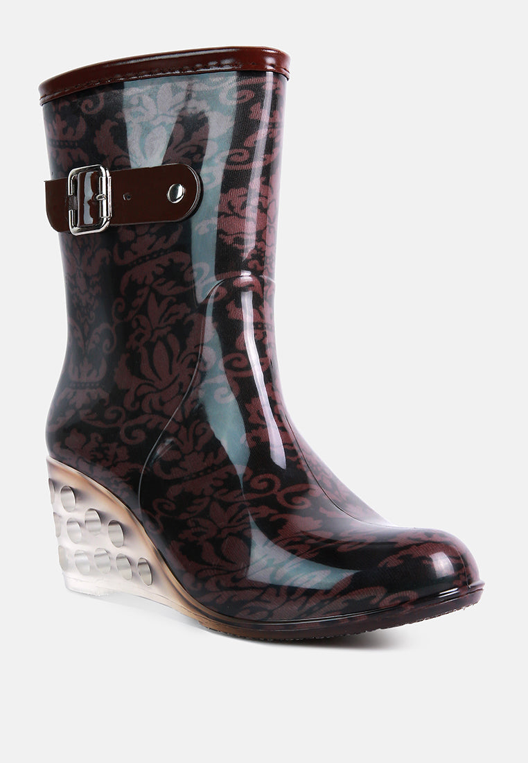 Stylish London Rag clear wedge rain boots with decorative buckle and floral pattern for rainy days