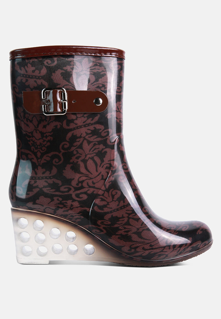 London Rag clear wedge rain boots with a stylish floral pattern and buckle detail