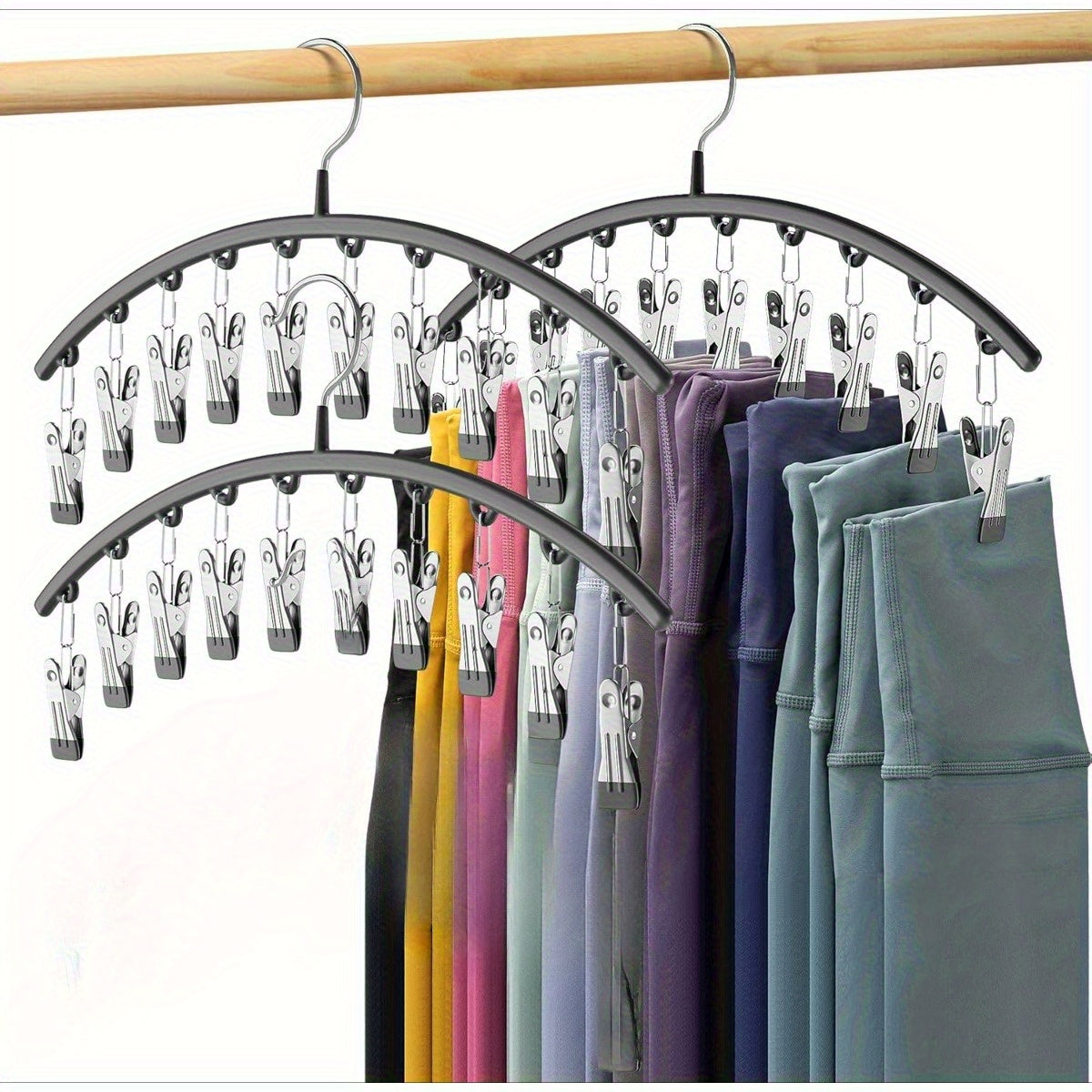 Black closet organizer with multiple clips for hanging clothes
