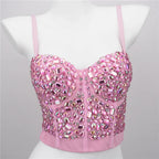 Pink jeweled cropped bustier on mannequin, embellished with crystals and boning, sexy club camisole top for party nights