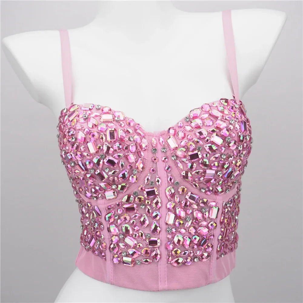 Pink jeweled cropped bustier on mannequin, embellished with crystals and boning, sexy club camisole top for party nights