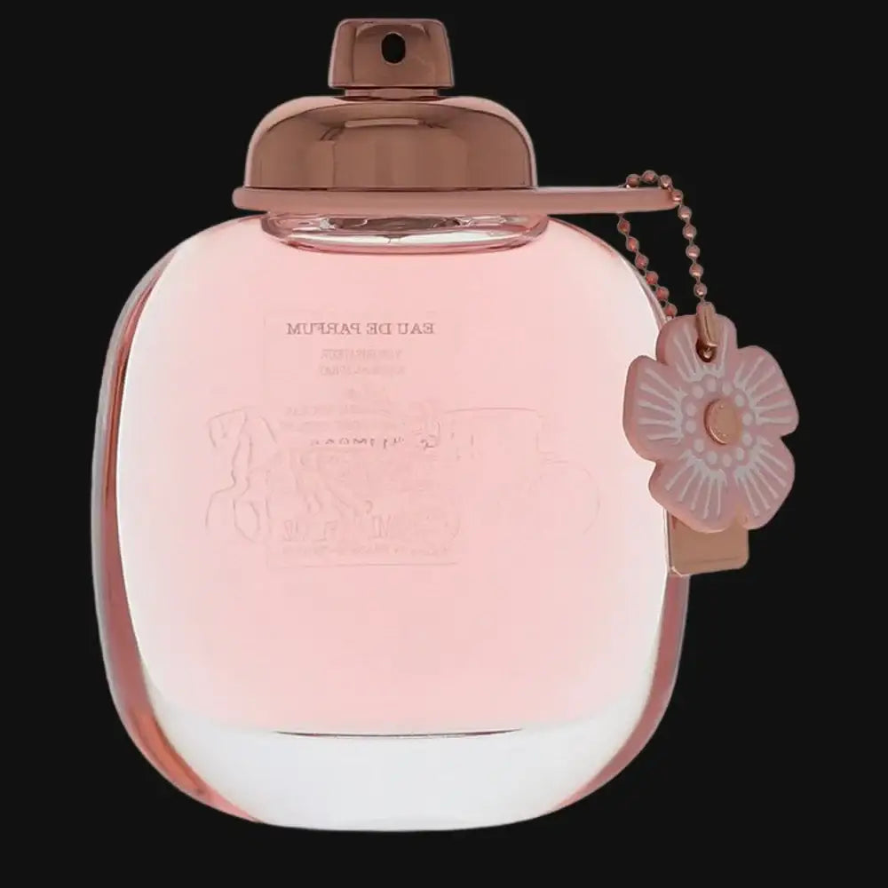 Coach Floral perfume for women in a stylish pink bottle with a floral charm