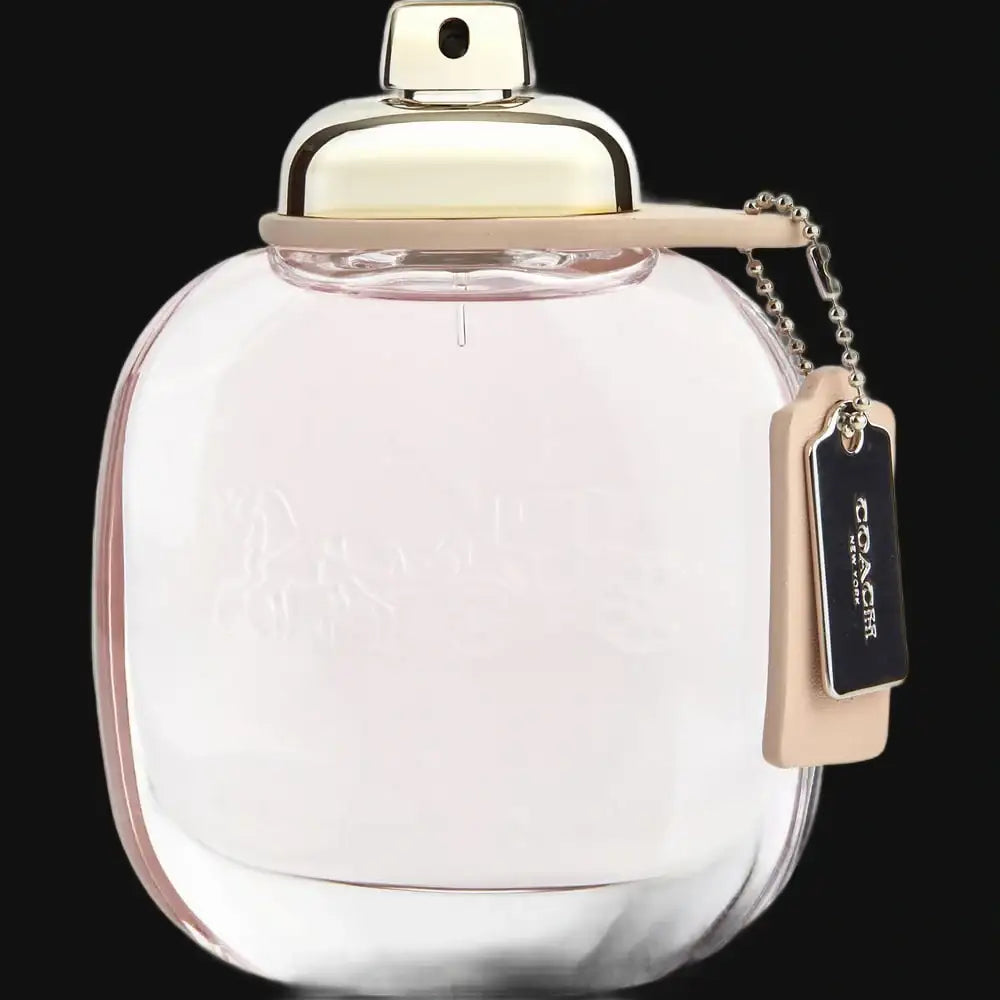 Gamer Scents Coach perfume for women in a stylish pink bottle with a gold cap