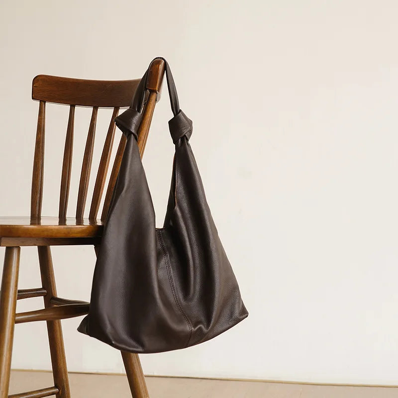 Black leather coach purse shoulder bag, perfect for casual outings