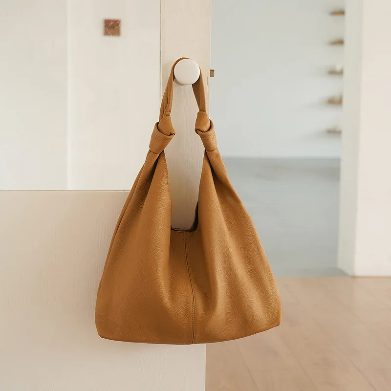 Tan leather coach purse shoulder bag for everyday use