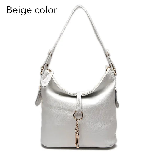 Beige leather coach purse shoulder bag for everyday use