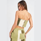 Emory Park color block corset top in green and cream with a zip closure and cropped design