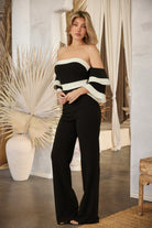 Elegant color block formal jumpsuit in black and white with off-shoulder design for stylish occasions