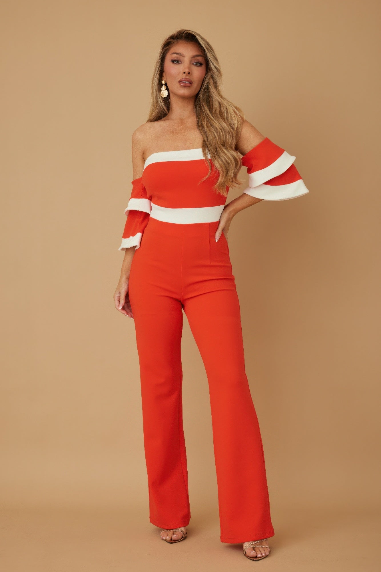 Stylish color block formal jumpsuit in red and white with off-shoulder design and flared pants