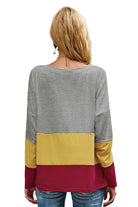 Women's color block top in gray, yellow, and maroon for casual wear