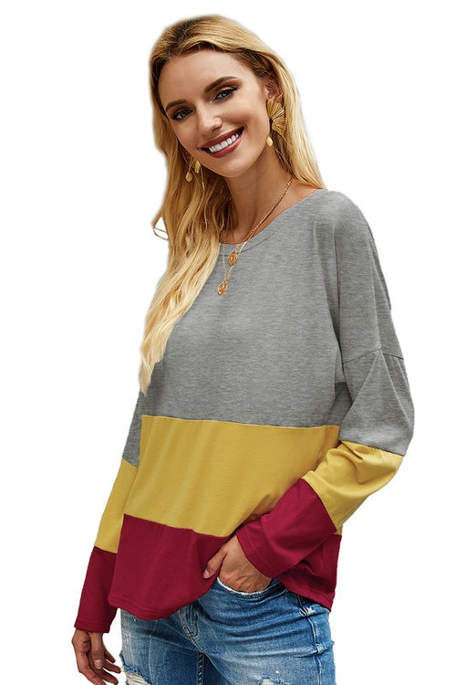 Women's color block top in grey, yellow, and burgundy, perfect for casual wear