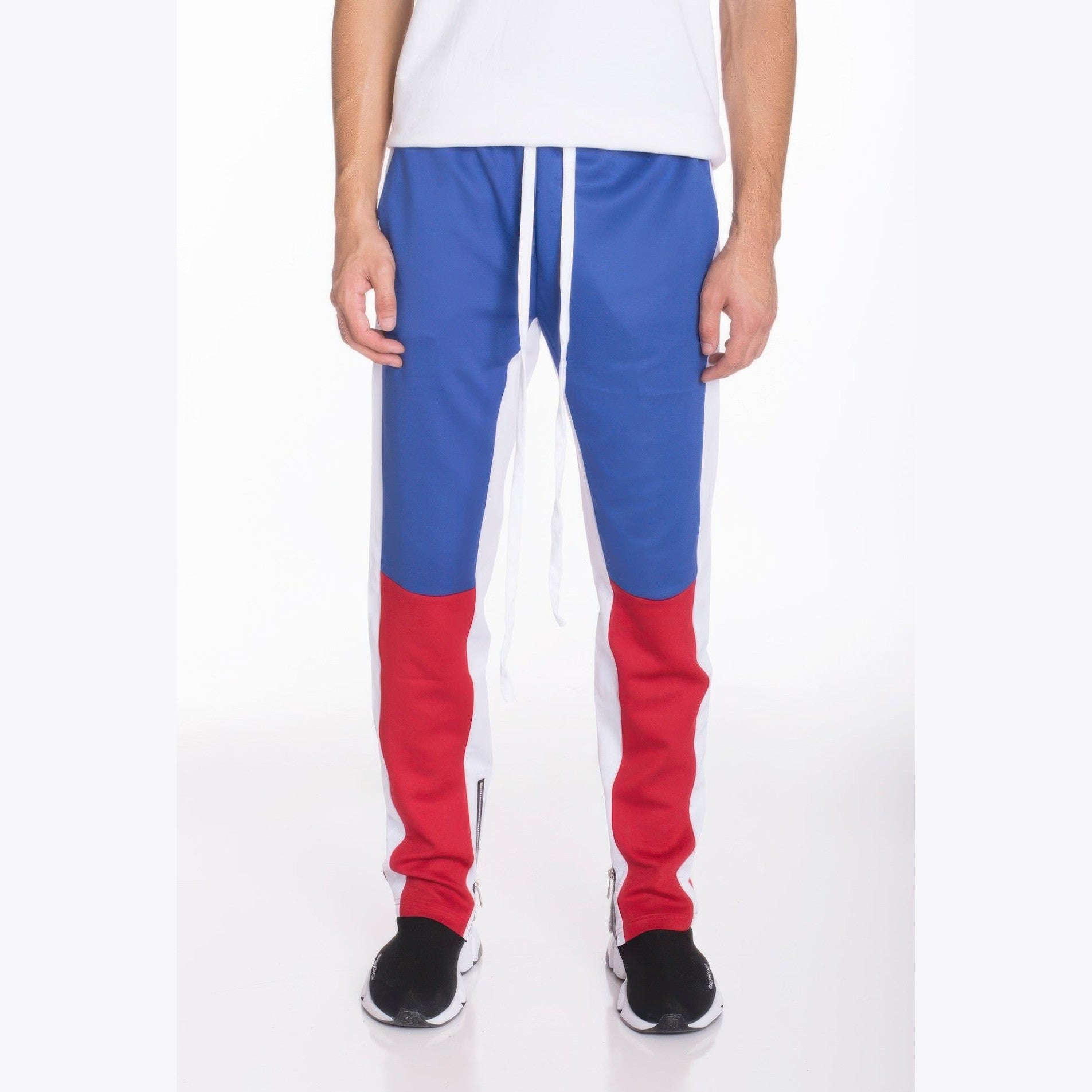 Color block track pants men in blue, red, and white with adjustable drawstring for active lifestyle