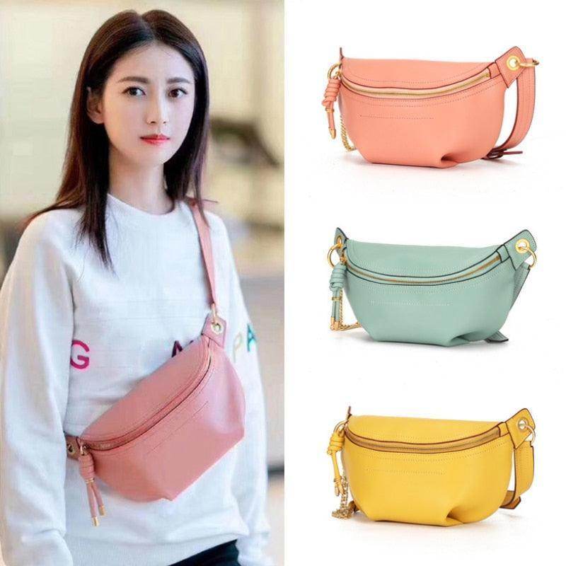 Colorful leather fanny packs in pink, mint, and yellow displayed on model for stylish travel convenience