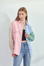 Colorful oversized shirt for women by Jade By Jane in pink, blue, green and beige worn with jeans