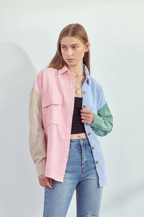 Colorful oversized shirt for women by Jade By Jane in pink, blue, green and beige worn with jeans