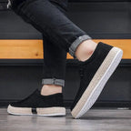 Black slip-on sneakers with jute sole, comfortable and stylish for casual wear