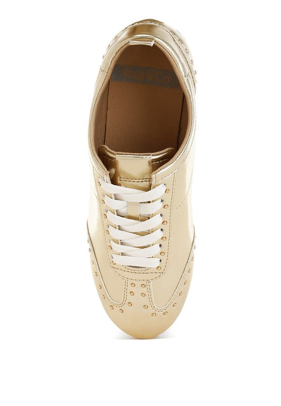 Women's gold cushiony flat walking shoes with comfortable fit for daily wear