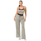 Women's comfortable matching loungewear set with gray wide-leg pants and black trim crop top