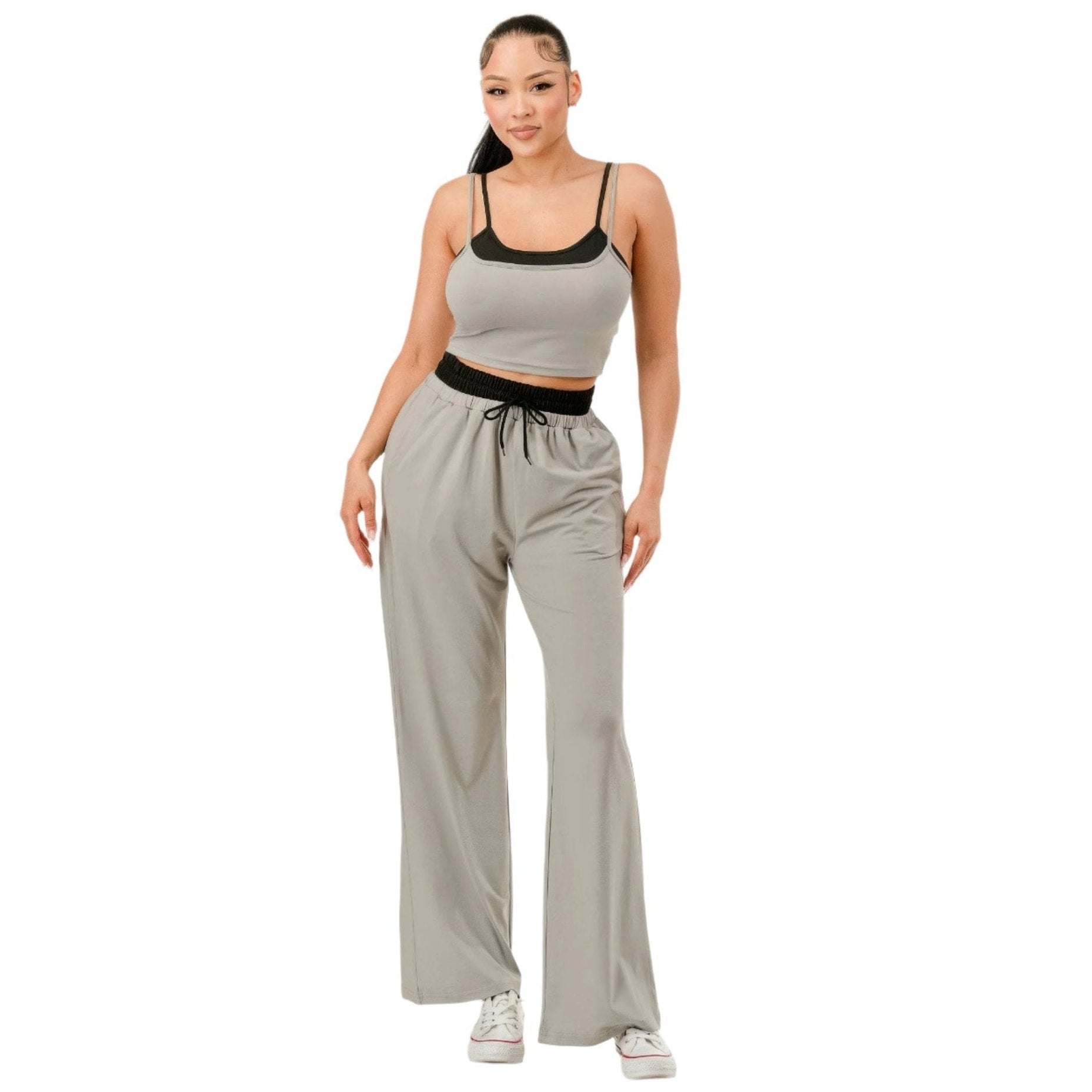 Women's comfortable matching loungewear set with gray wide-leg pants and black trim crop top