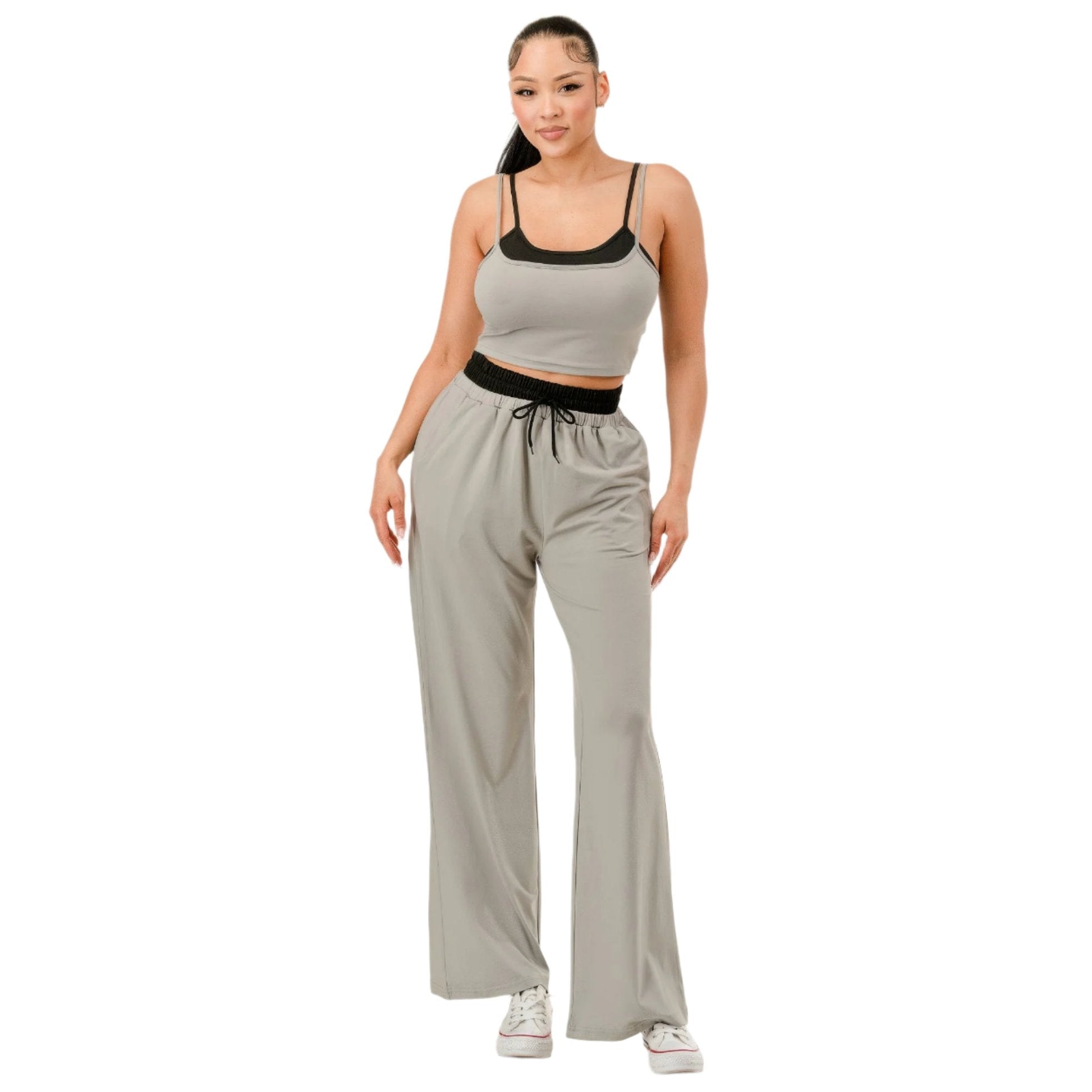 Women's comfortable matching loungewear set with gray wide-leg pants and black trim crop top