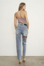 Women's relaxed fit distressed jeans from Denim Lab USA, perfect for comfortable travel denim