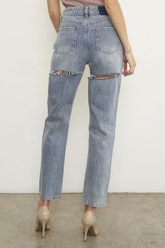 Back view of Women's Denim Lab USA comfortable travel denim with distressed details