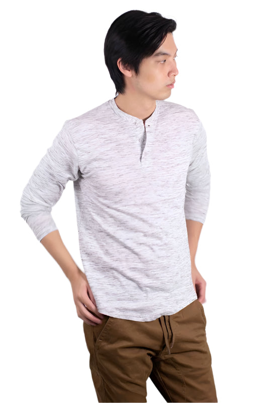 Generation XYZ men's comfortable travel Henley shirt in light gray worn with brown pants