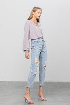 Women's comfortable travel jeans by Denim Lab USA with stylish ripped details for casual outings