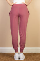 VacationGrabs women's comfortable travel joggers in mauve color with elastic cuffs and pockets