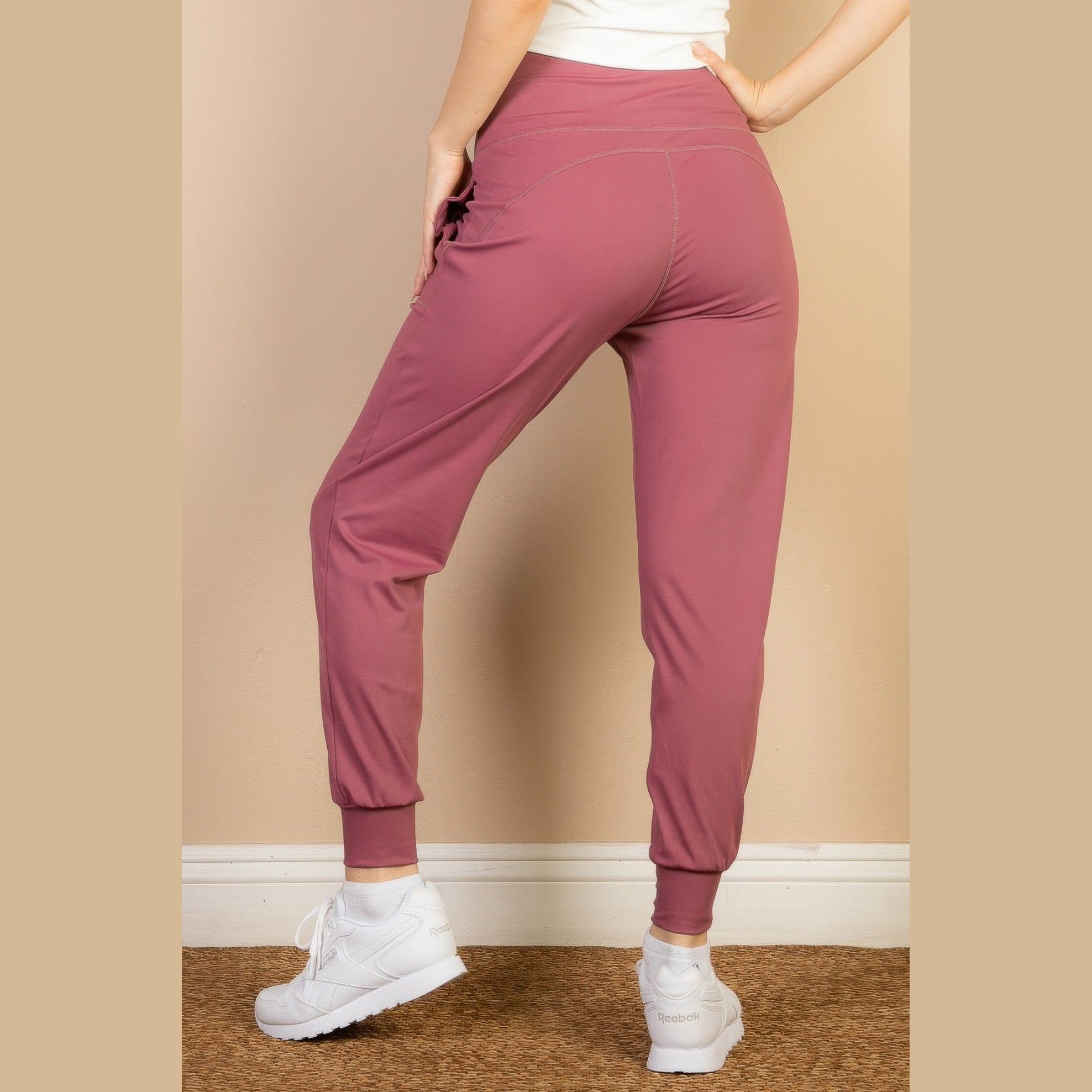 VacationGrabs women's comfortable travel joggers in mauve color with cuffed ankles