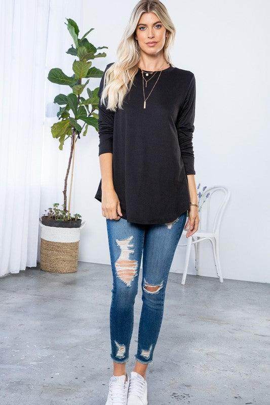 P & ROSE COLLECTION comfortable vacation tops in black with long sleeves, paired with distressed jeans
