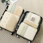 Compression packing cubes for travel in pastel colors for organized luggage