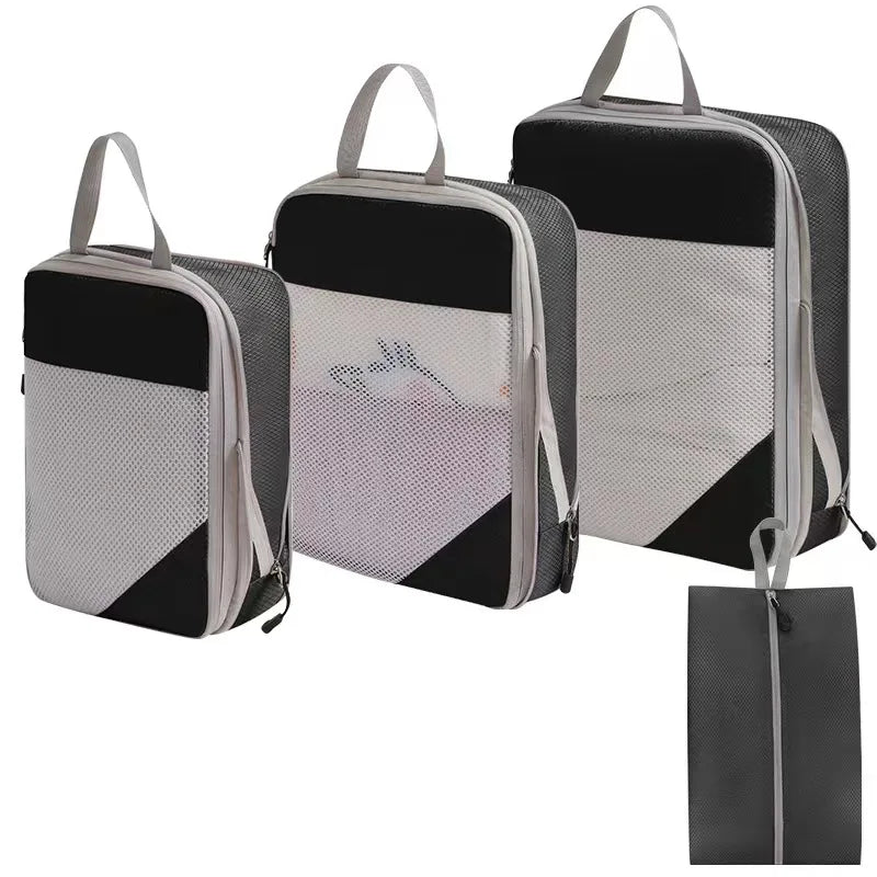 Black compression packing cubes for travel, durable material, set of three
