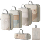 Vacuum-sealed compression packing cubes for travel, durable fabric, beige color