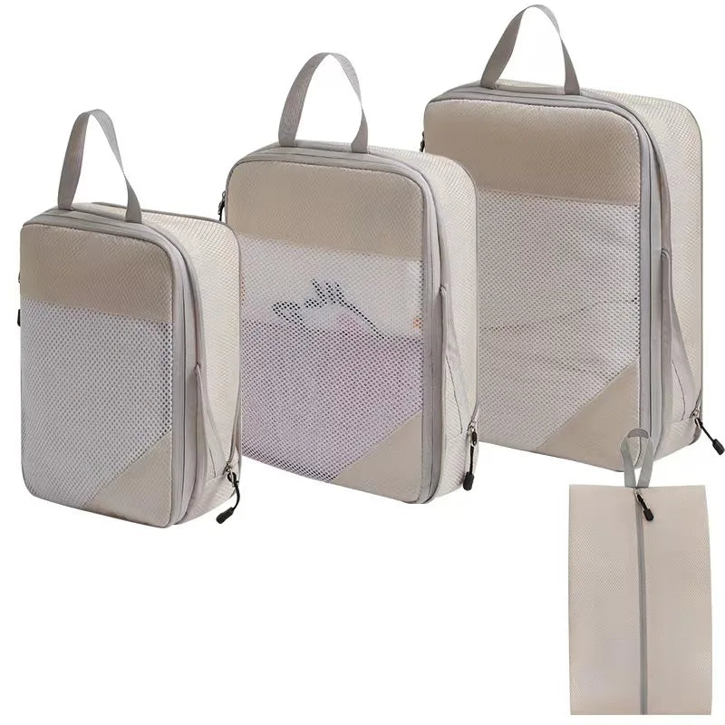 Beige compression packing cubes for travel in three sizes