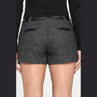 Back view of Miley + Molly women's contrast waistband shorts with stylish pockets