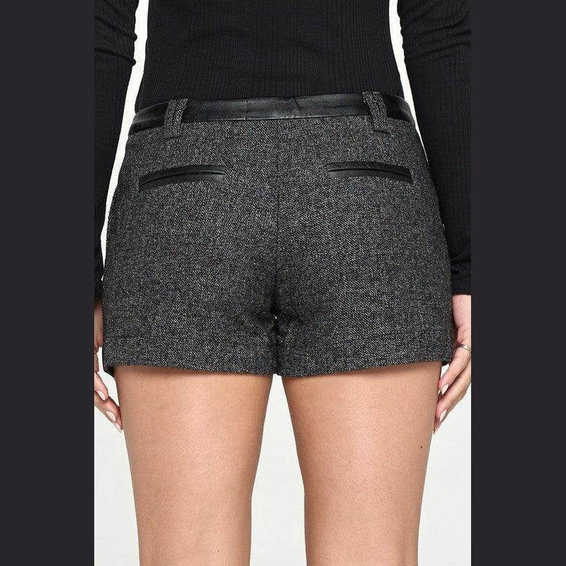 Back view of Miley + Molly women's contrast waistband shorts with stylish pockets